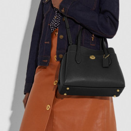 coach bolsa original price