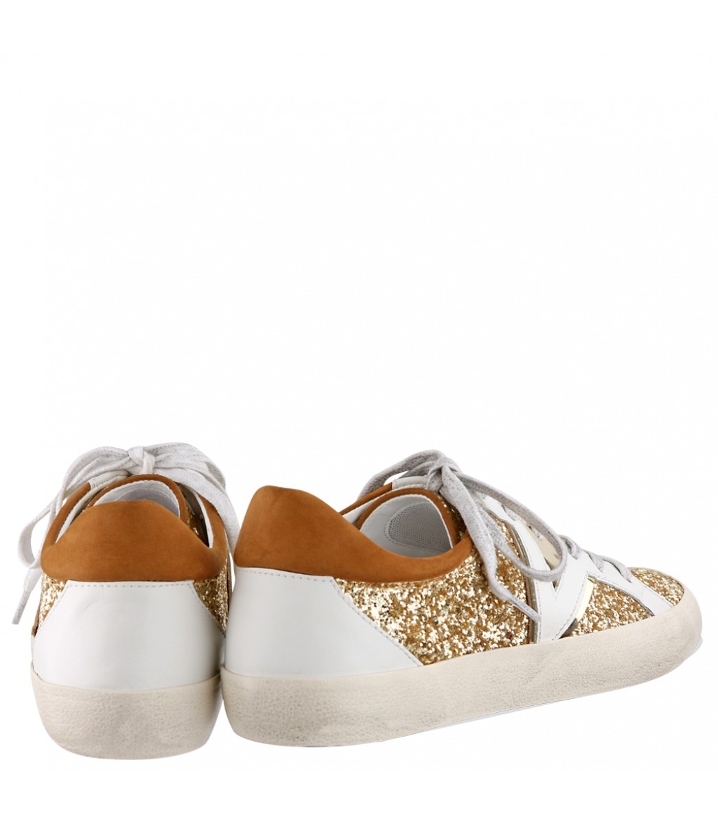 tenis dourado schutz